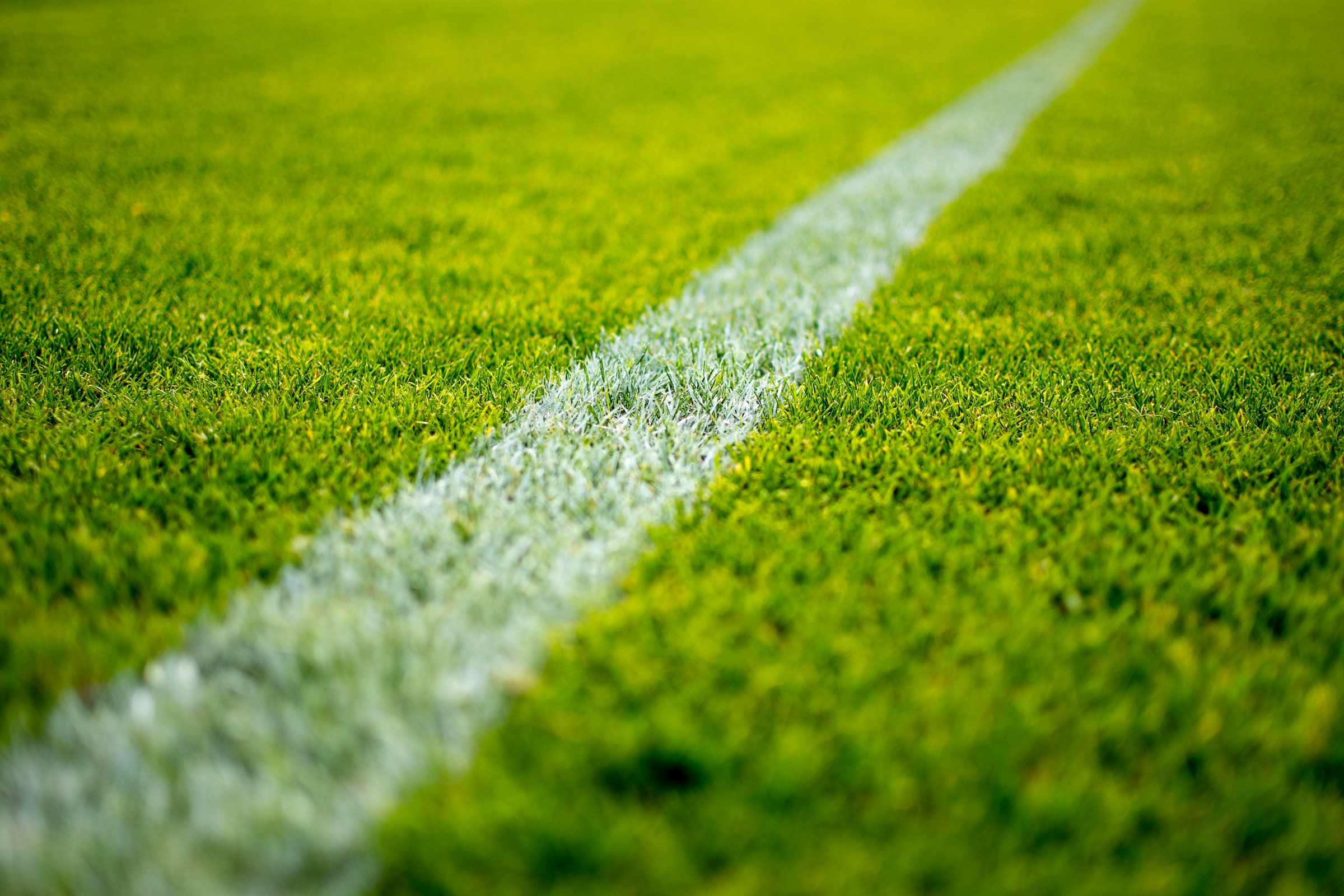 Image of football field - Photo by Peter Glaser on Unsplash